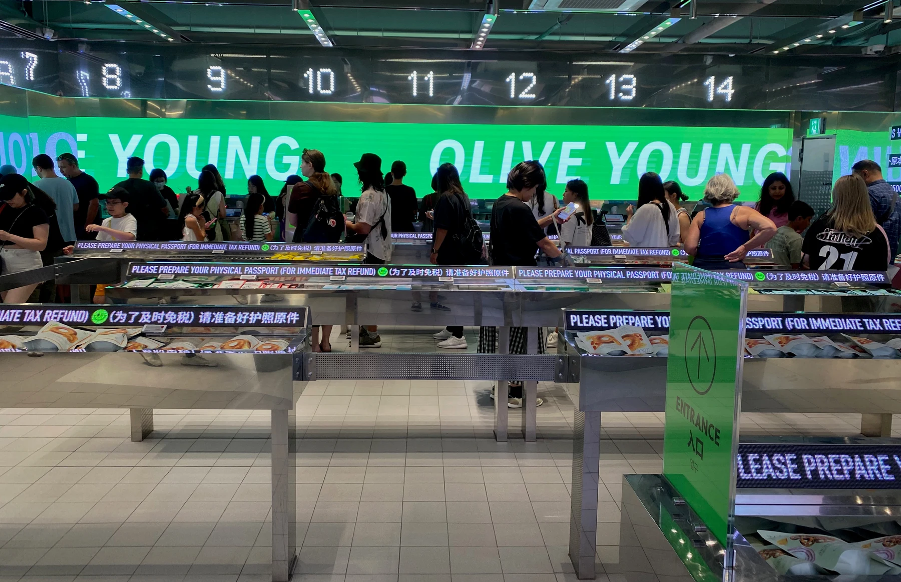 Context: checkout area at Olive Young in Myeongdong, Seoul, 19 August 2024; company retail context, not Seongsu, Pasadena, Sephora or a US warehouse.