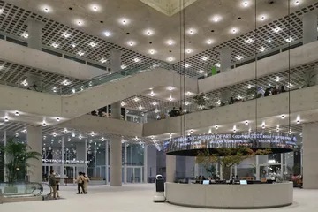 Context: interior public atrium and museum entrance at Amorepacific headquarters in Seoul on 26 November 2022; company context, not an earnings event.