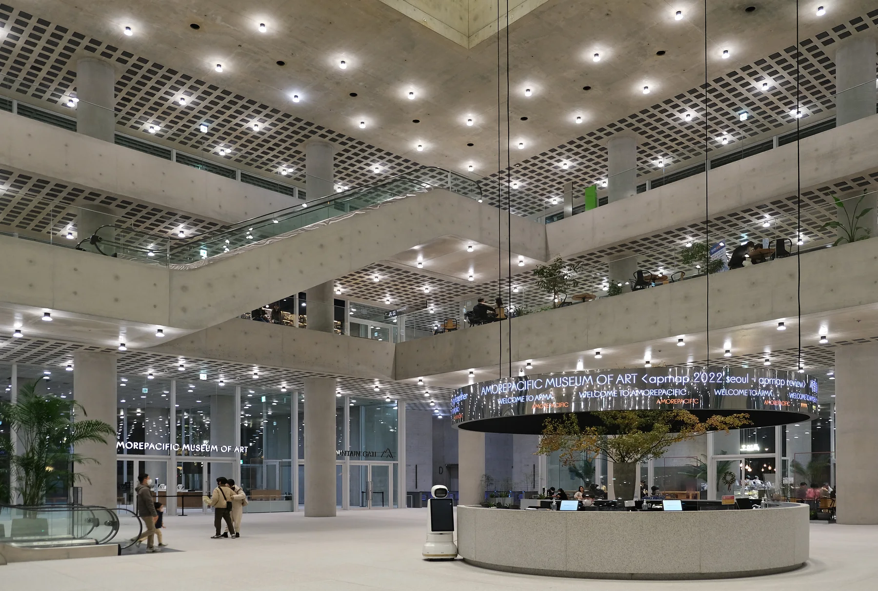 Context: interior public atrium and museum entrance at Amorepacific headquarters in Seoul on 26 November 2022; company context, not an earnings event.