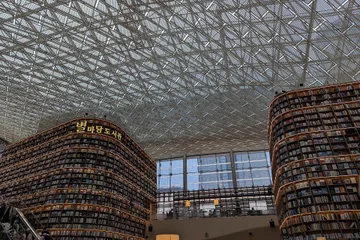 Starfield Library at COEX Mall in Seoul in February 2024; retail and cultural context, not Warner IP or transaction evidence