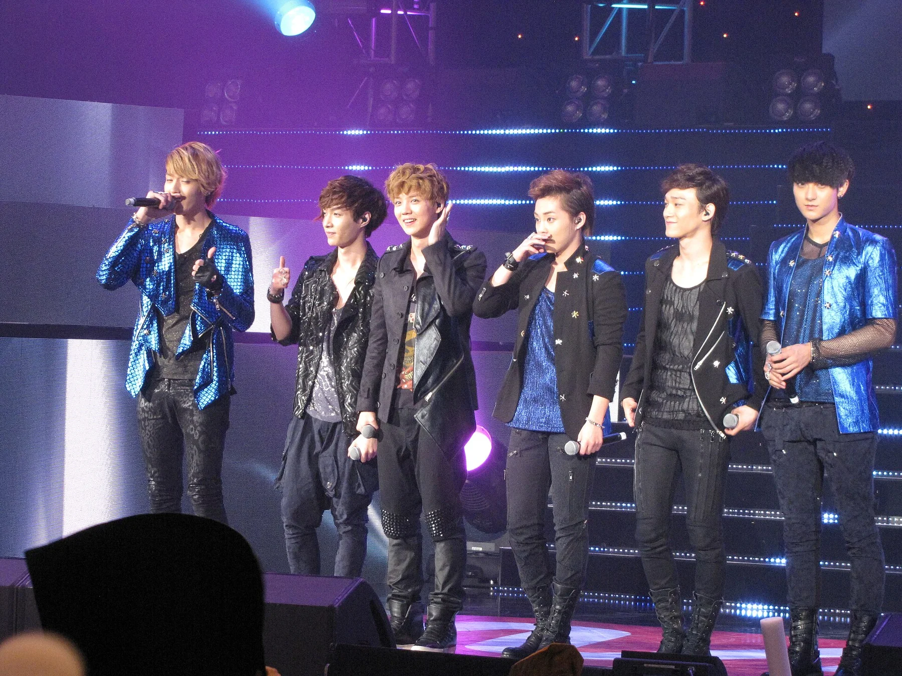 Context: EXO-M performing at KCON on 13 October 2012; historic SM artist and fan-engagement context, not bubble or QQ Music launch imagery.