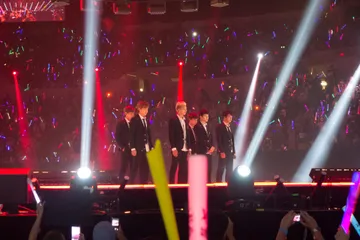 Context: BTS performing at KCON on 10 August 2014; historic Korean artist-development context, not HYBE India, Mumbai or its local talent programme.